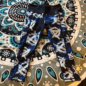 CVG Reversible Lawless and Peace Sign Capri Leggings